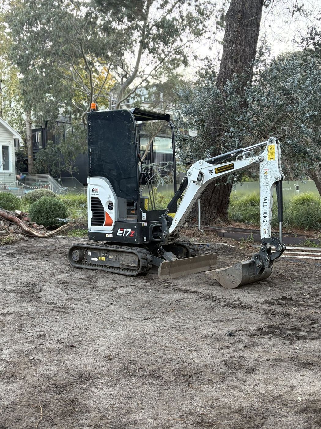 1.7 tonne mini excavator hired from Moreland Bin Hire on a backyard dig